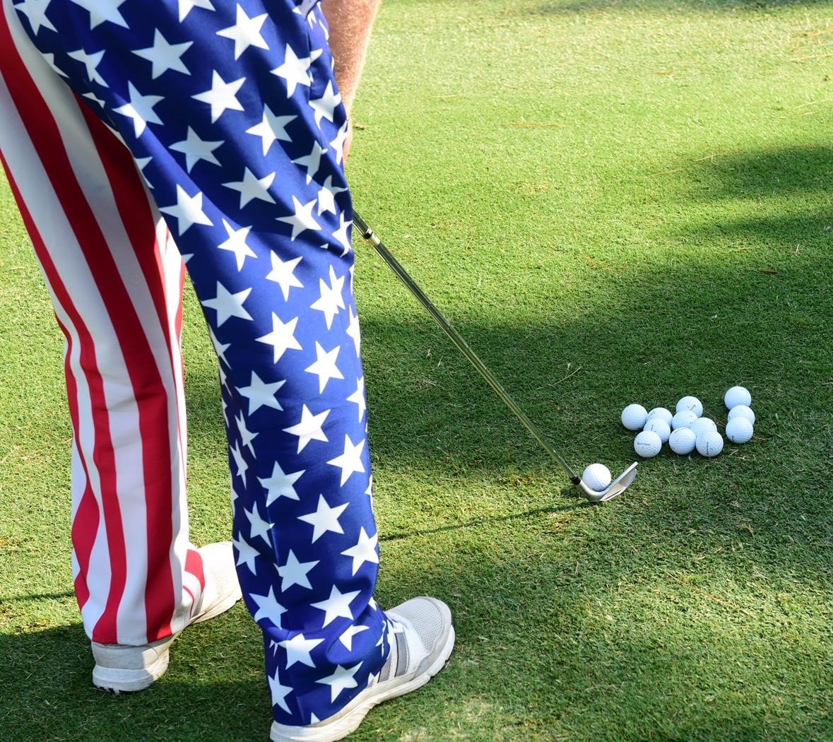Golfer in patriotic American flag attire at the Golf Classic